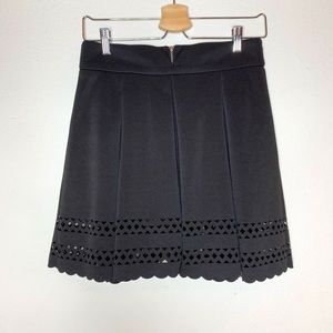 Francesca’s- Alya Black Pleated Skirt w/ Laser Cut